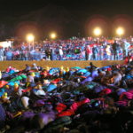 Illuminated bodies at Gallipoli awaiting the Anzac Dawn Service